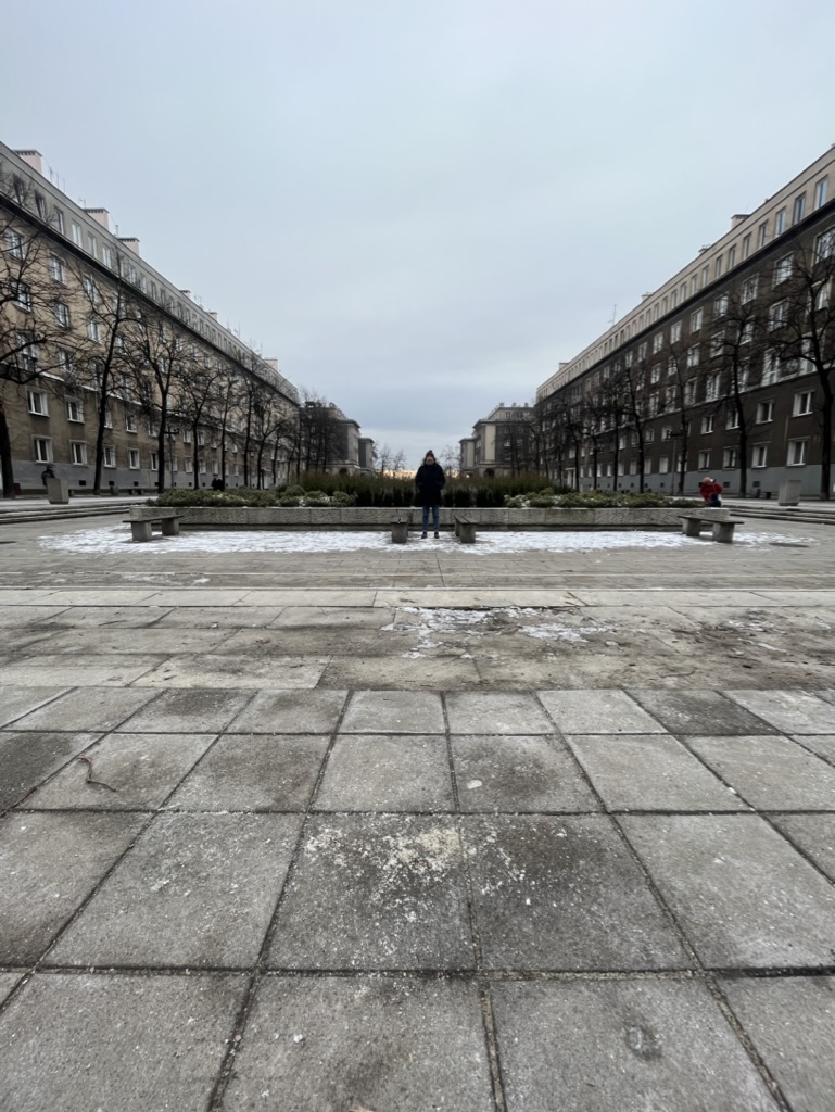 Title: Plac Centralny Nowa Huta - Description: Plac Centralny in Nowa Huta, Kraków, with socialist realist apartment blocks flanking the central green in winter