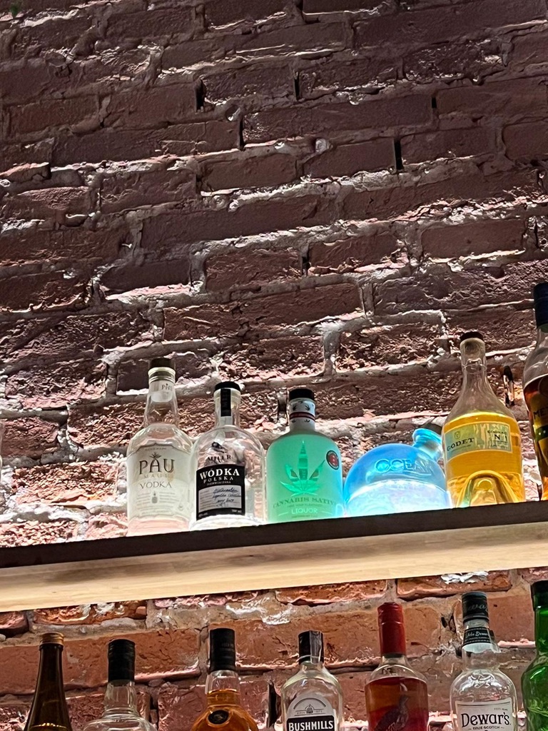 Vodka tasting flight with traditional Polish accompaniments in Kraków